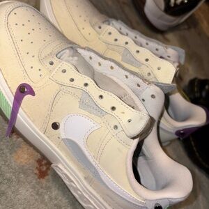 Cream and White Sneakers with Purple Accents